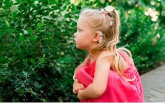 Is it good for my child to get a cochlear implant?